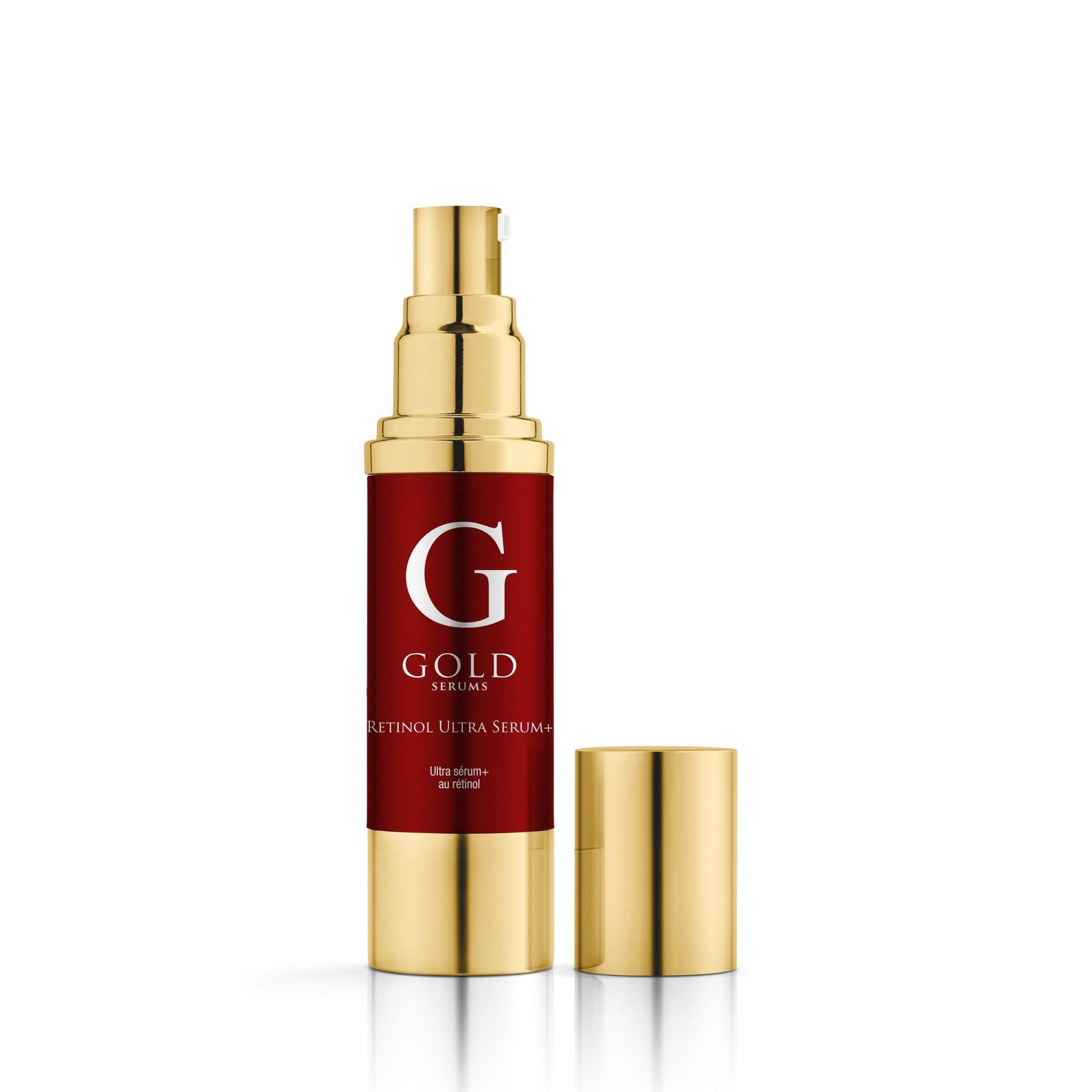 Goldfarbene Flasche mit roter Beschriftung und goldener Kappe. Aufschrift: "G GOLD SERUMS".