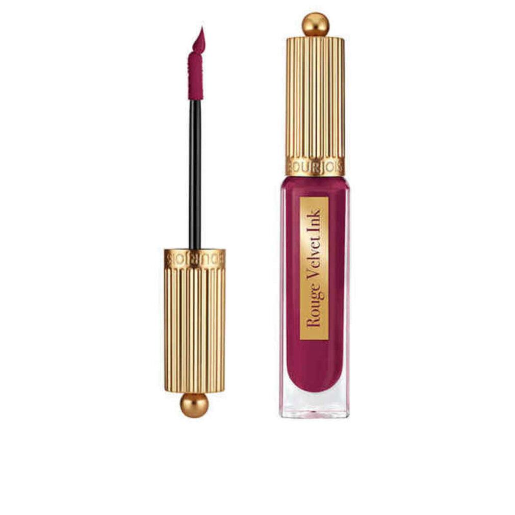 Lippenstift mit goldfarbenem Deckel und Applikator. Der Lippenstift ist geöffnet, der Applikator ist sichtbar.