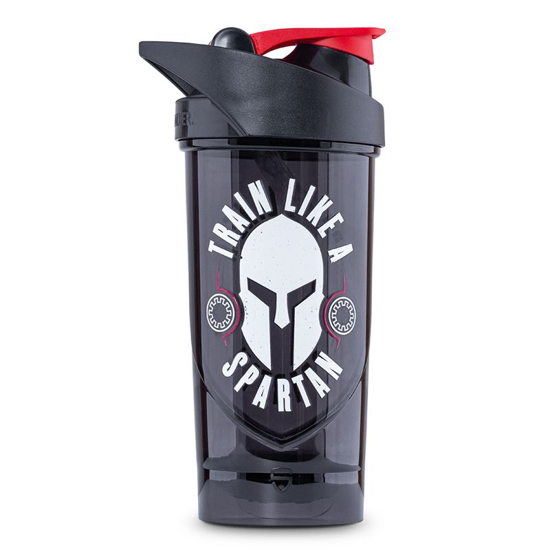 Shaker noir avec couvercle rouge. Inscription « Train Like a Spartan » avec logo de casque. Récipient en plastique.