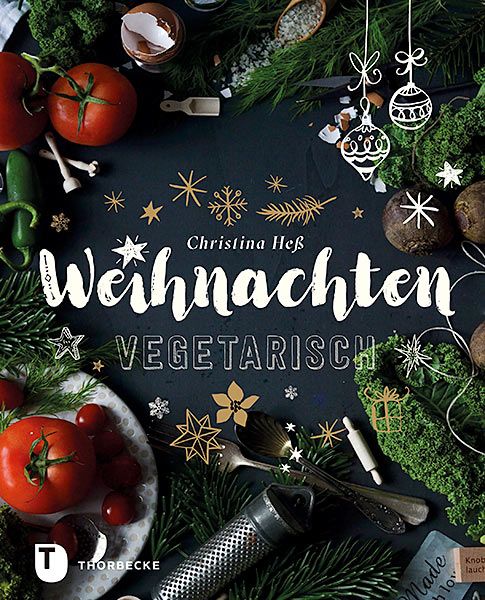 Buchcover mit dem Titel „Weihnachten vegetarisch“. Autorin: Christina Heß. Dekoration mit Gemüse, Gewürzen und Weihnachtsornamenten.