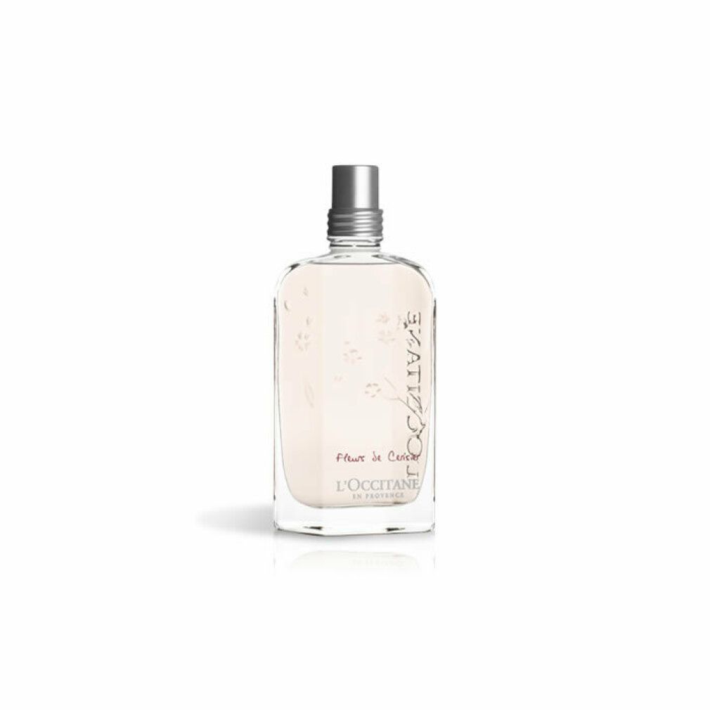 Klarer Flakon mit rosa Flüssigkeit. Silberner Verschluss. Aufschrift: L'Occitane, Fleurs de Cerisier.