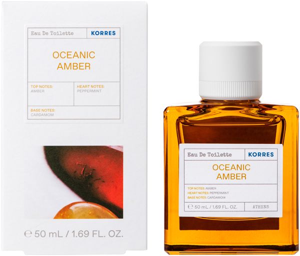 KORRES Eau de Toilette Oceanic Amber. Flakon und Verpackung. Eckiger Flakon, bernsteinfarben. Weiße Verpackung mit Produktinformationen.