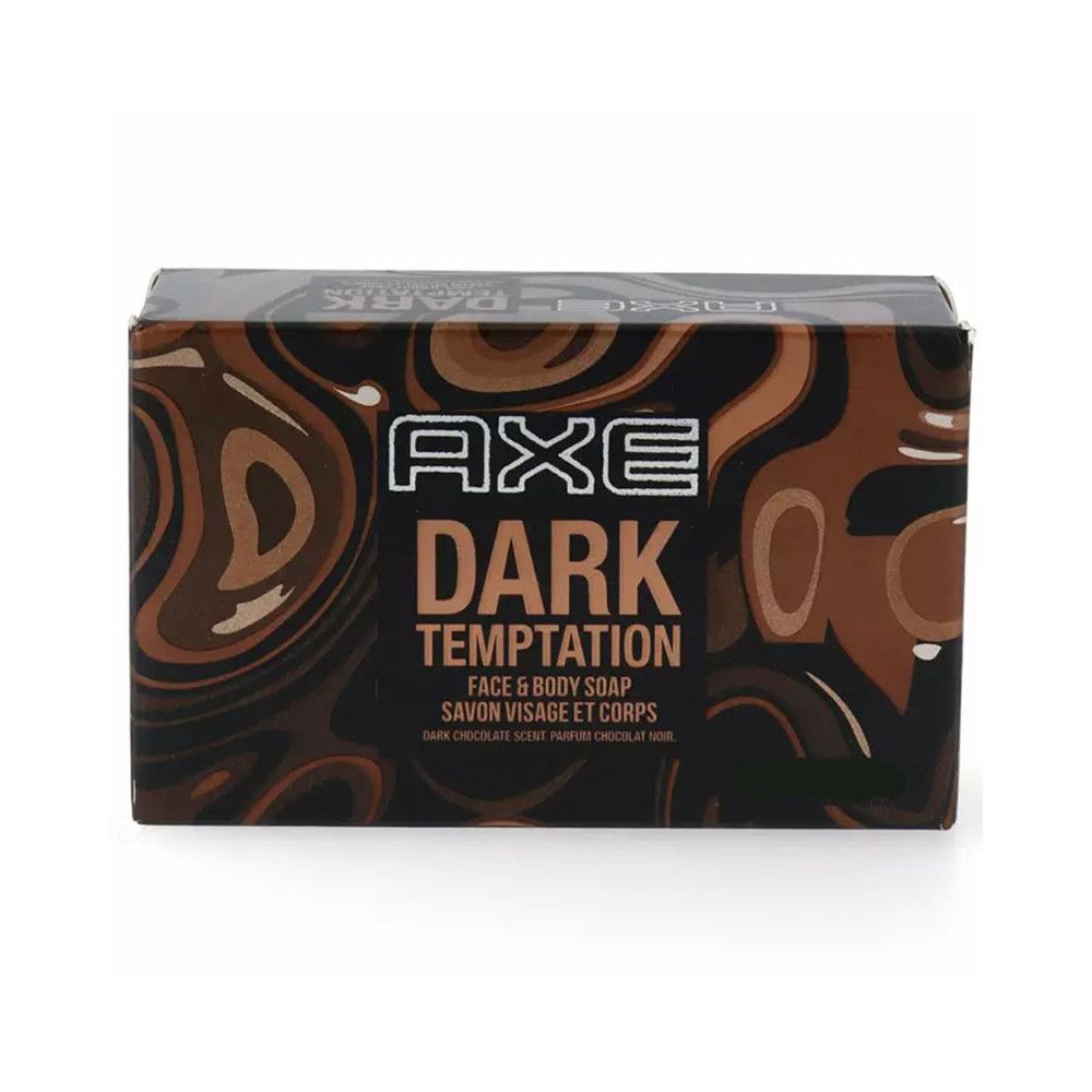 Kartonverpackung von Axe Dark Temptation. Schwarzer Hintergrund mit braunen Wirbeln. Schriftzug: Axe, Dark Temptation, Face & Body Soap.
