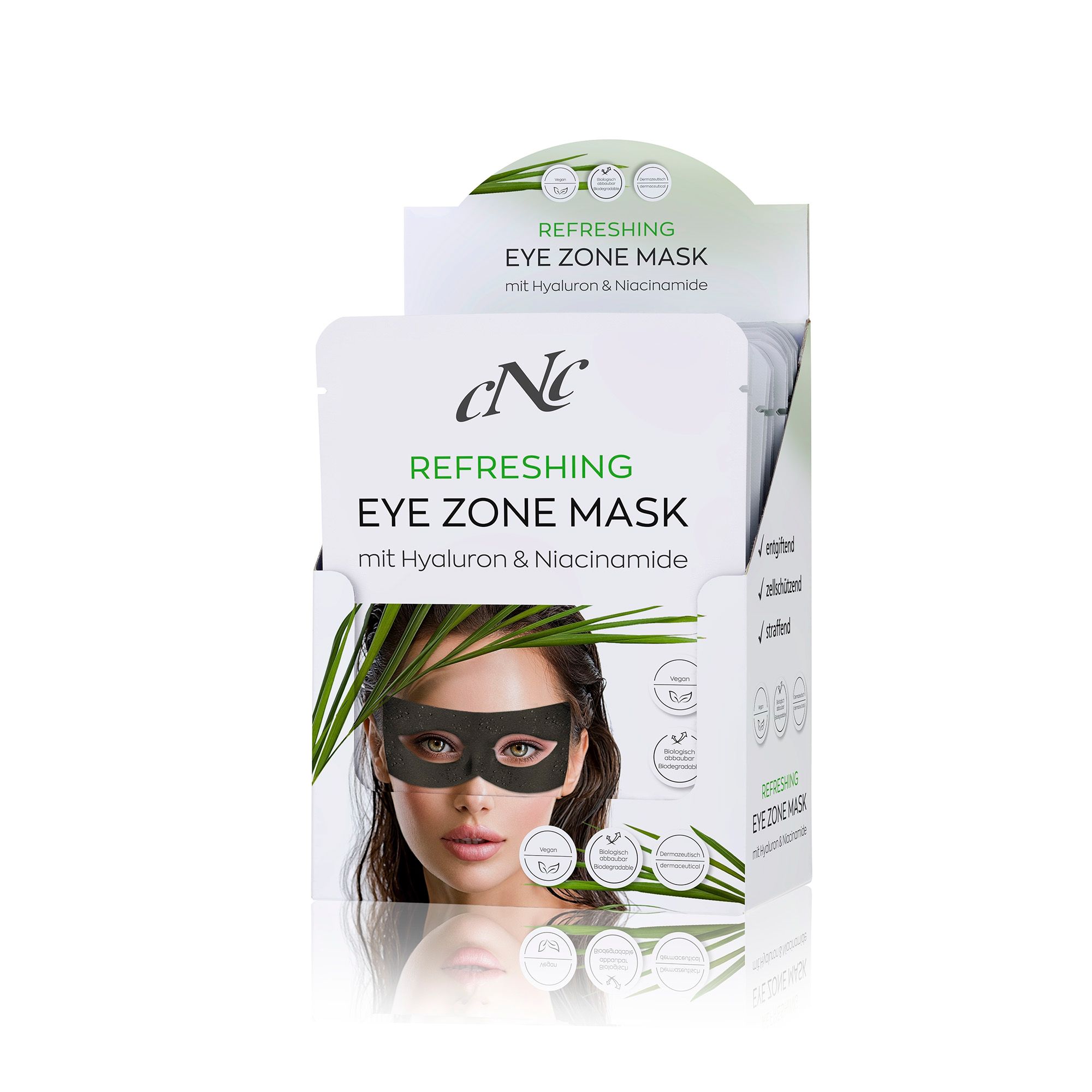 Verpackung mit Augenmasken. Aufdruck: CNC Refreshing Eye Zone Mask mit Hyaluron & Niacinamide. Abbildung einer Frau mit Maske.