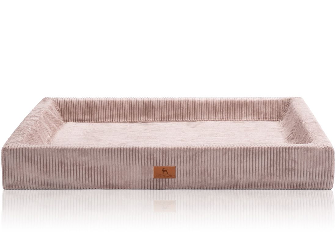 Orthopädisches Hundebett, rechteckig, rosa, Cordstoff. Mit Logo-Etikett.