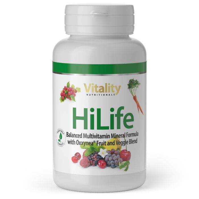 Vitality Nutritionals HiLife Multivitamin Kapselbehälter mit Obst- und Gemüsedekoration.