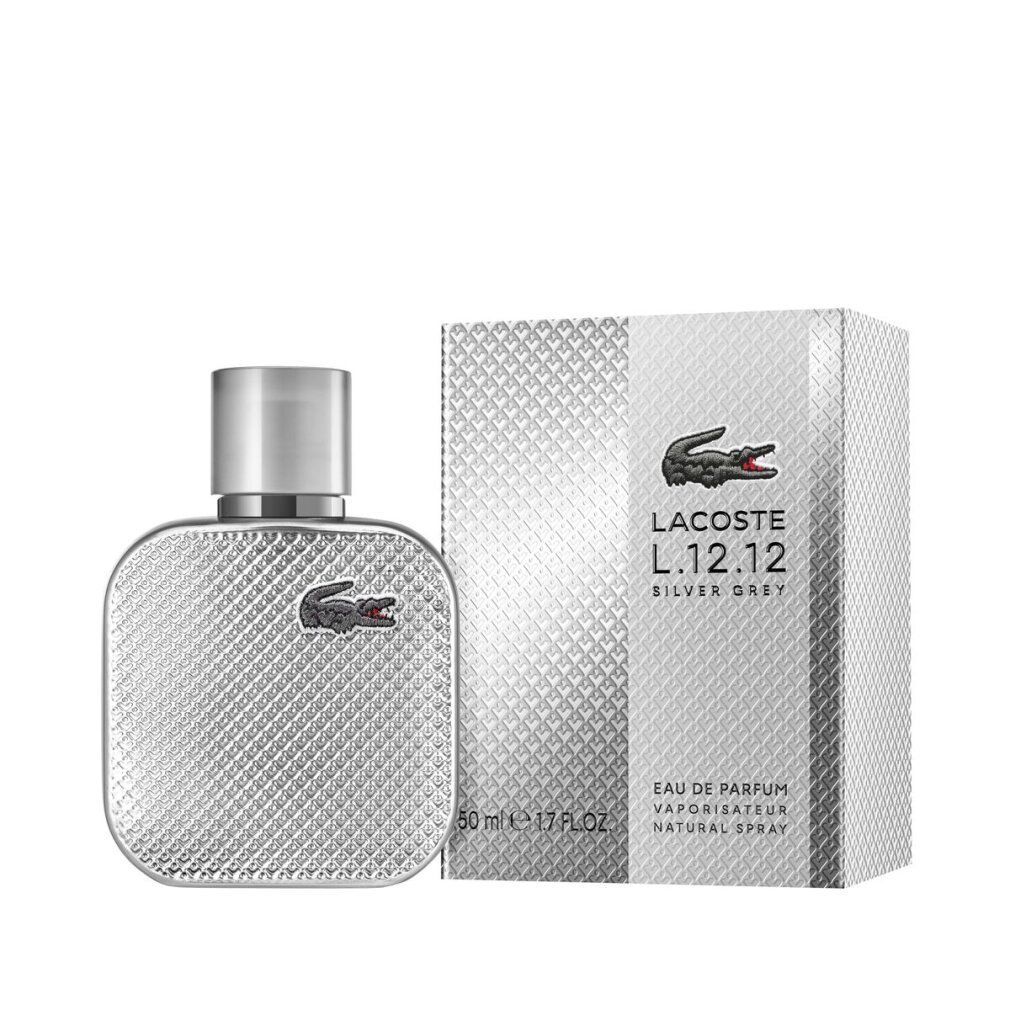 Silberfarbener Flakon und Verpackung. Schwarzes Krokodil-Logo. Text: LACOSTE L.12.12 SILVER GREY. 50 ml. Eau de Parfum.