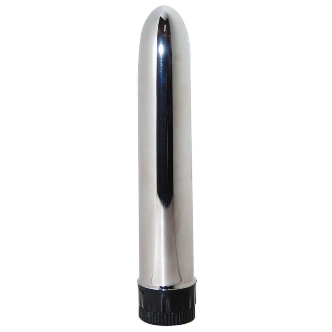 Silberner Vibrator mit schwarzem Sockel. Zylindrische Form mit abgerundeter Spitze.