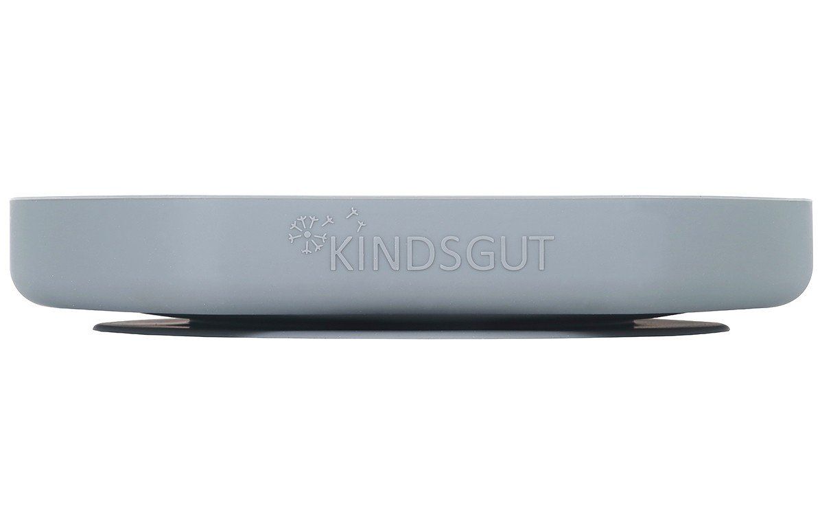 Dunkelgrauer Teller mit Kindsgut-Logo. Runde Form, Silikon, schwarzer Saugnapf.