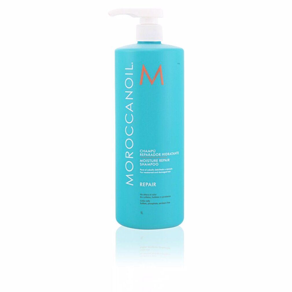 Türkisfarbene Shampoo-Flasche mit weißem Pumpkopf. Aufschrift: Moroccanoil, Moisture Repair Shampoo, Repair. Orangefarbenes Logo.