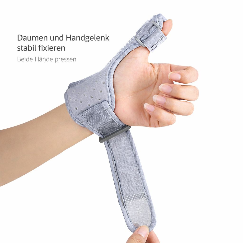 Graue Handgelenk- und Daumenbandage am Handgelenk. Der Daumen ist in der Bandage. Klettverschluss.