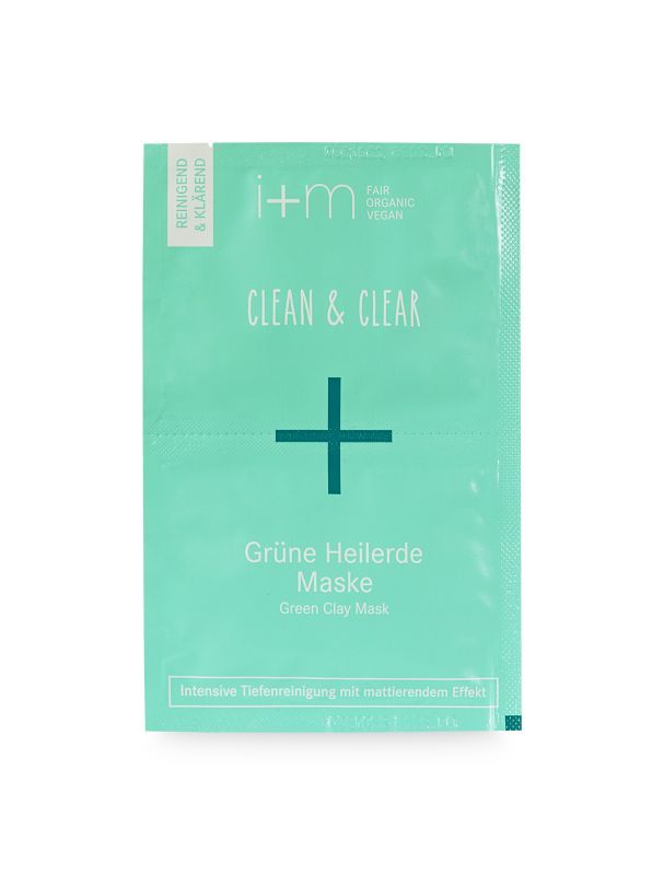 Grüne Maske-Verpackung. Text: i+m, Clean & Clear, Grüne Heilerde Maske. Vegan-Siegel. Reinigend & klärend. Intensive Tiefenreinigung.