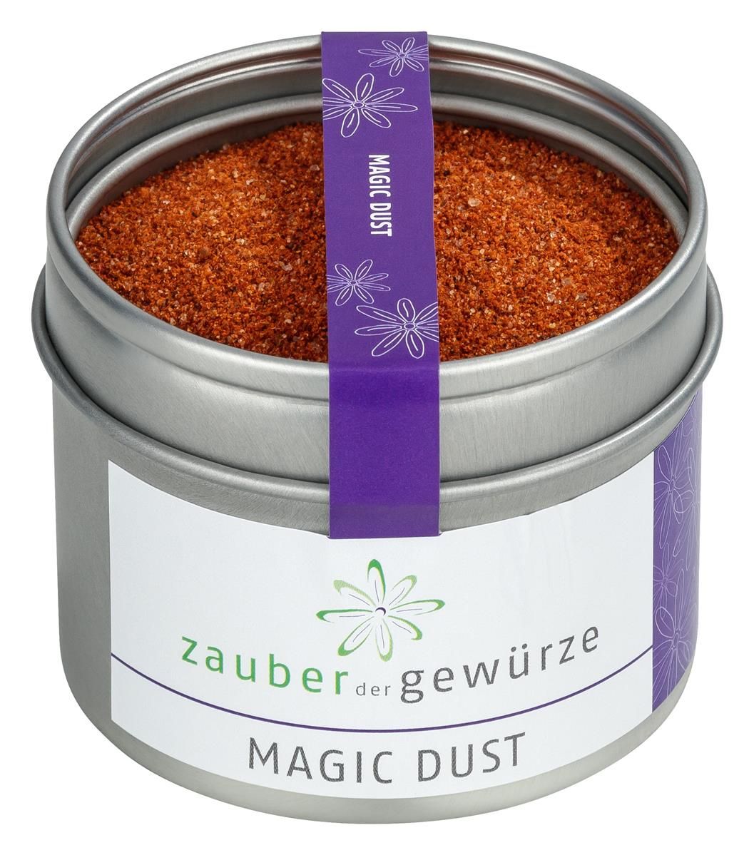 Runde Dose mit Zauber der Gewürze Magic Dust. Lila Band mit Schriftzug. Offene Dose mit Gewürzmischung.