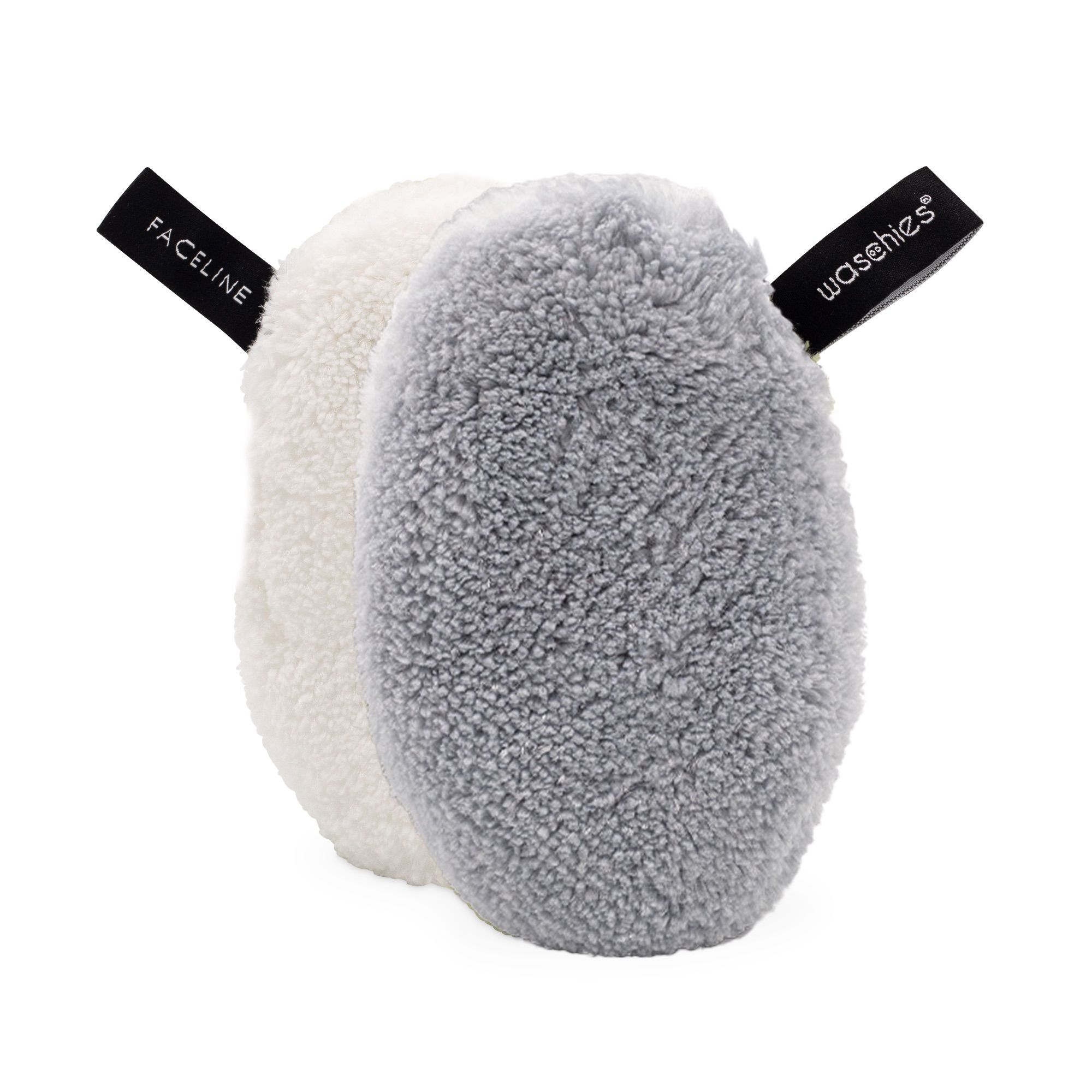 Zwei Abschminkpads, grau und weiß. Schwarze Label mit "FACELINE" und "waschies". Flauschiges Material, ovale Form.