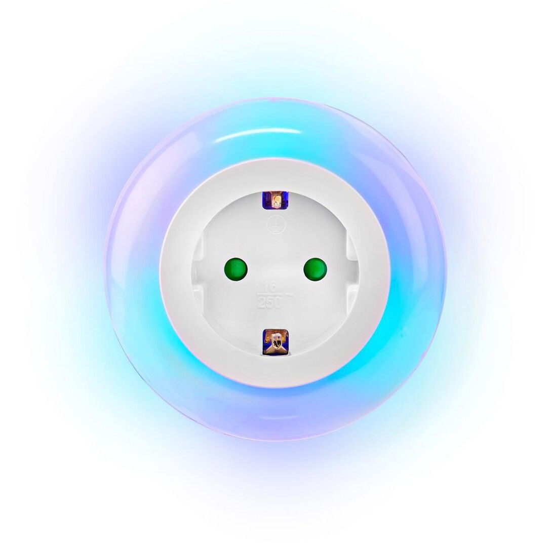 Draufsicht auf ein Nachtlicht mit Steckdose. Runde Form, farbiges Licht um die Steckdose. Grüne Punkte.