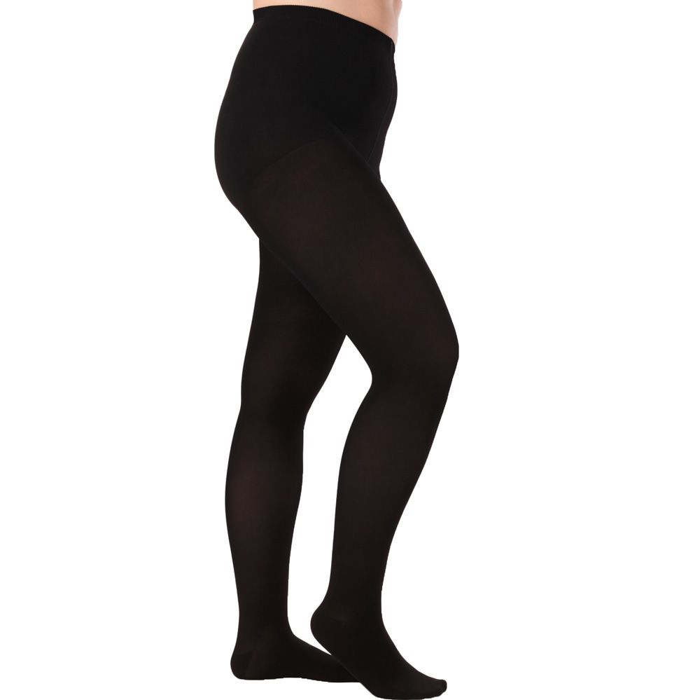 Schwarze Kompressionsstrumpfhose. Blick von der Seite auf eine Person, die sie trägt. Blick auf die Beine und den Bauch.