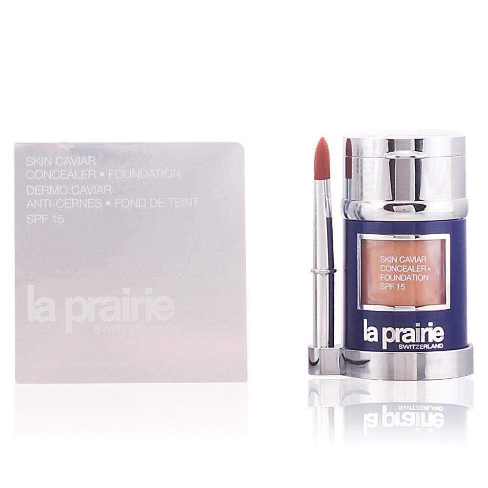 La Prairie Skin Caviar Foundation, Pinsel, und Verpackung. Blau-silberne Tube mit Produkt, Pinsel, und silberne Verpackung.