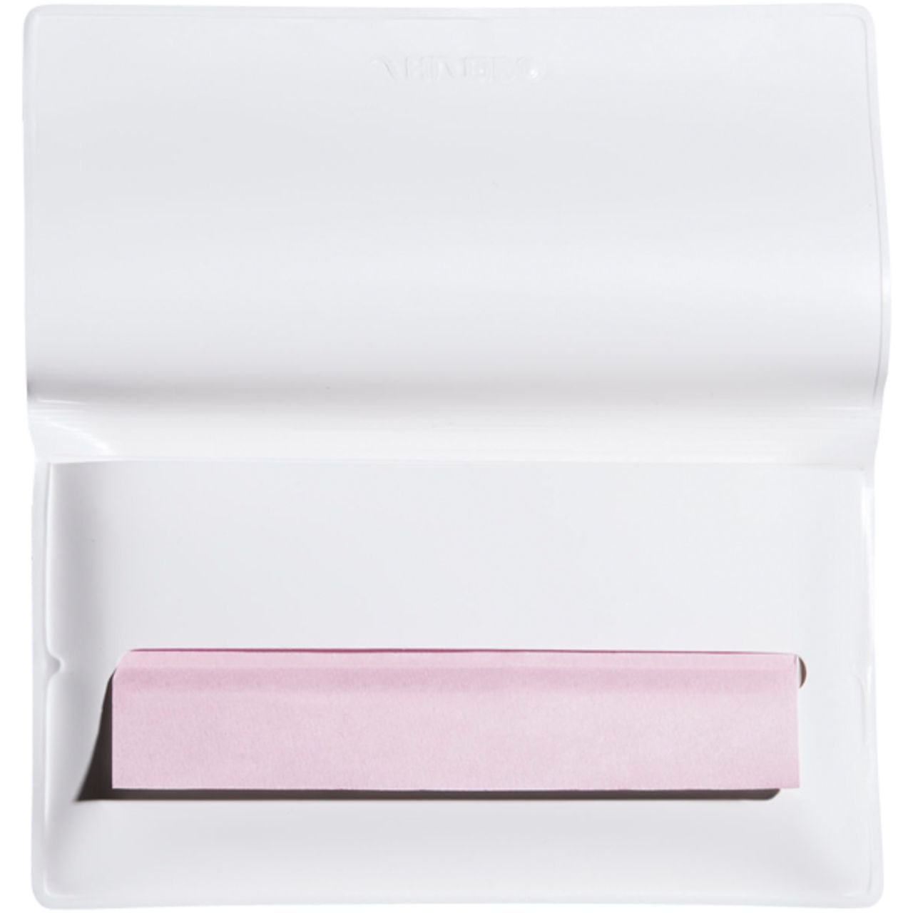 Weißes Etui mit einem Block rosa Blotting Paper. Der Block ist rechteckig und liegt in der Mitte des Etuis.