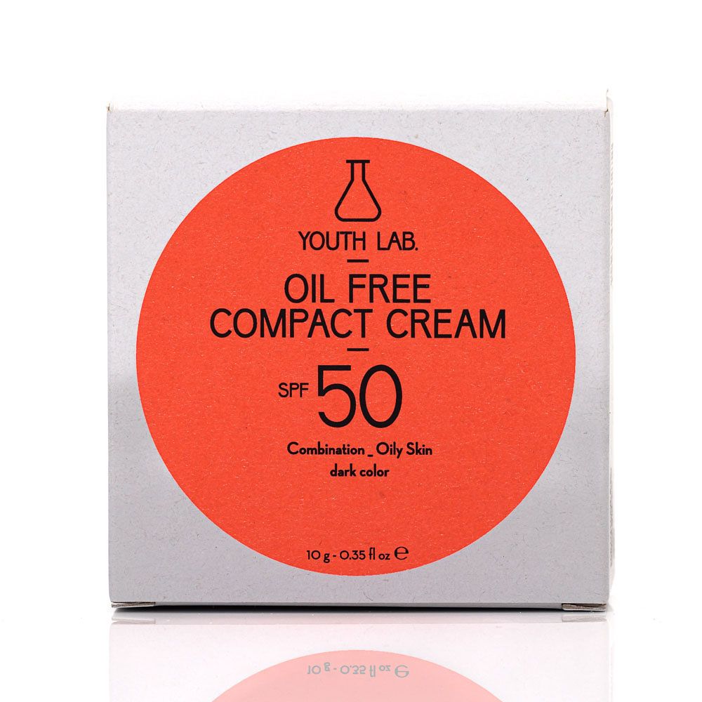 Weiße Schachtel mit rotem Kreis. Text: YOUTH LAB OIL FREE COMPACT CREAM SPF 50. Für Mischhaut/fettige Haut, dunkle Farbe. 10g.