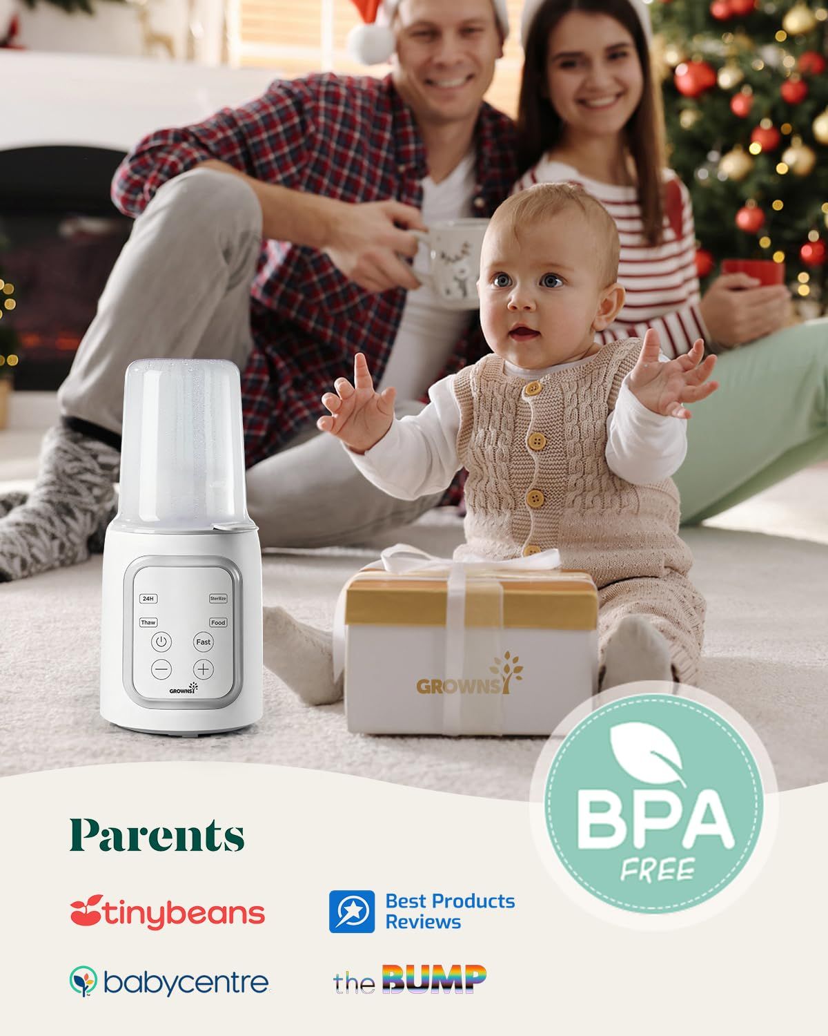 Ein weißer Babyflaschenwärmer mit Bedienfeld und ein Geschenk daneben. BPA-frei-Siegel.