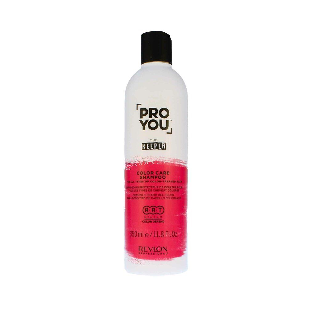 Weiße Flasche mit schwarzem Deckel. Aufschrift: PRO YOU THE KEEPER COLOR CARE SHAMPOO. Rosa Farbband. 350ml/11.8 FL.OZ. REVON PROFESSIONAL.