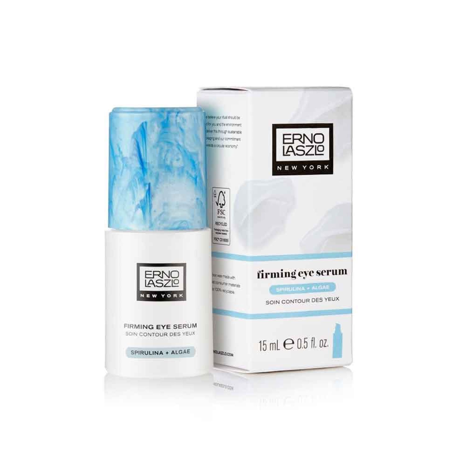 Erno Laszlo Firmarine Firming Eye Serum. Weiße Flasche mit blauem Deckel. Karton mit Produktinformationen. Aufschrift: Firming Eye Serum.