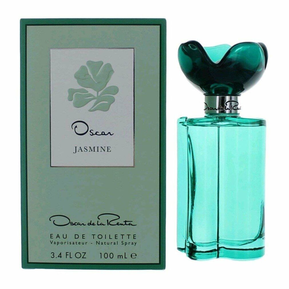 Grüne Flasche mit Blumendeckel neben einer grünen Schachtel. Auf der Schachtel steht "Oscar Jasmine" und "Oscar de la Renta".