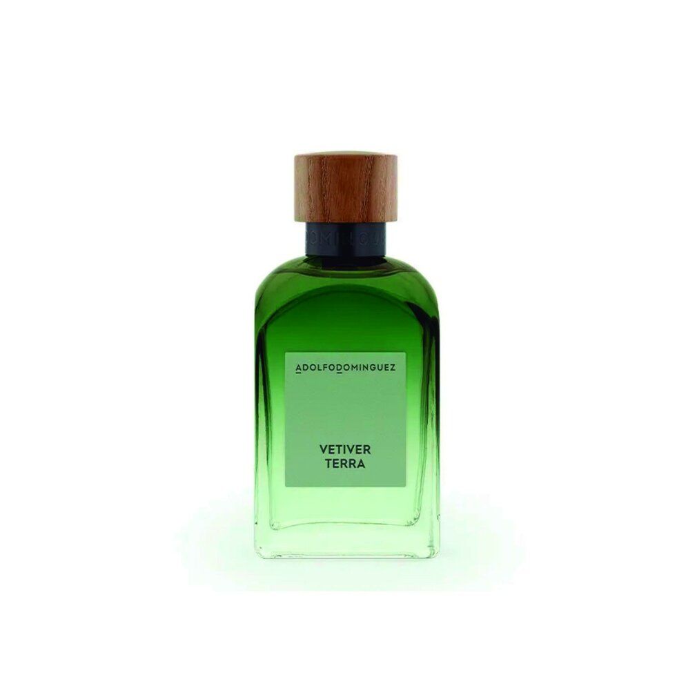 Grüne Glasflasche mit Holzverschluss. Aufschrift: ADOLFODOMINGUEZ, VETIVER TERRA. Quadratische Form mit abgerundeten Ecken.