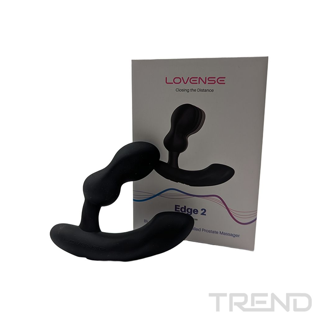 Schwarzer Prostata-Massager neben der Verpackung mit Produktabbildung und 'Edge 2' Schriftzug.