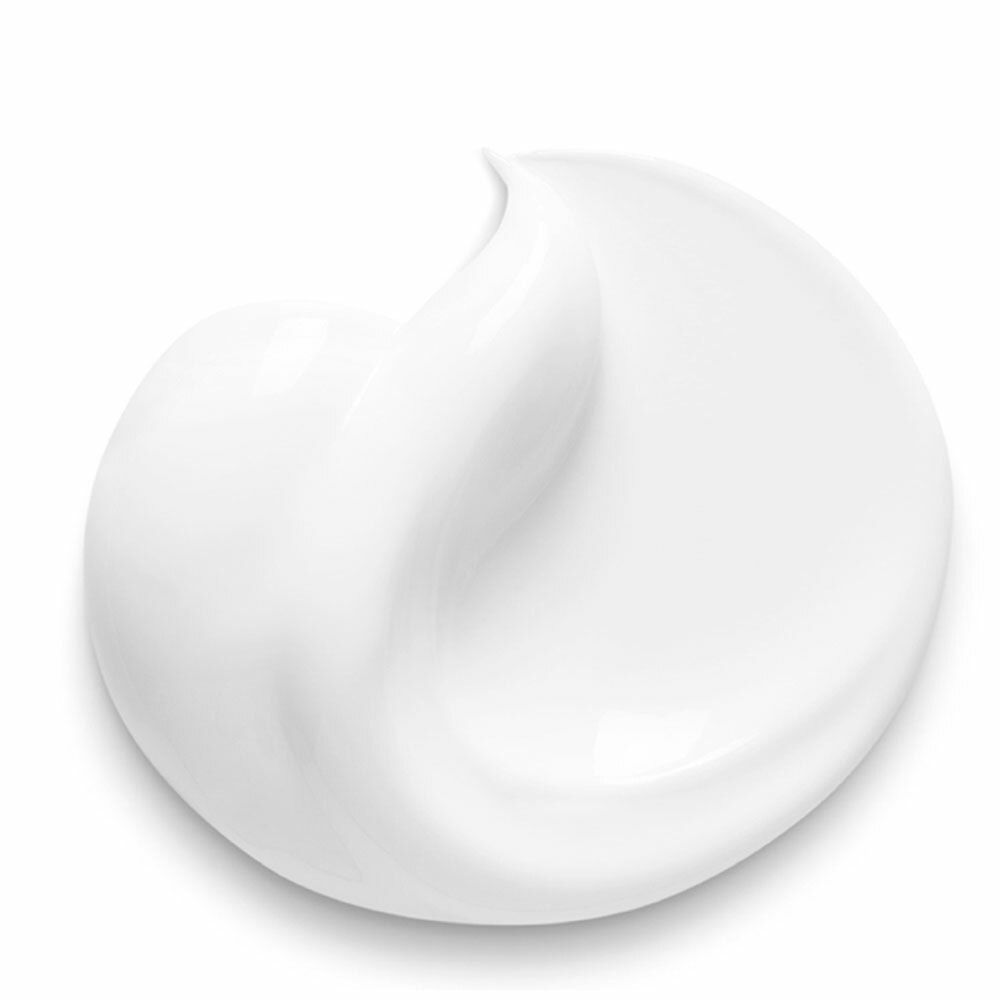 Nahaufnahme einer weißen Creme. Glatte, gewölbte Form.