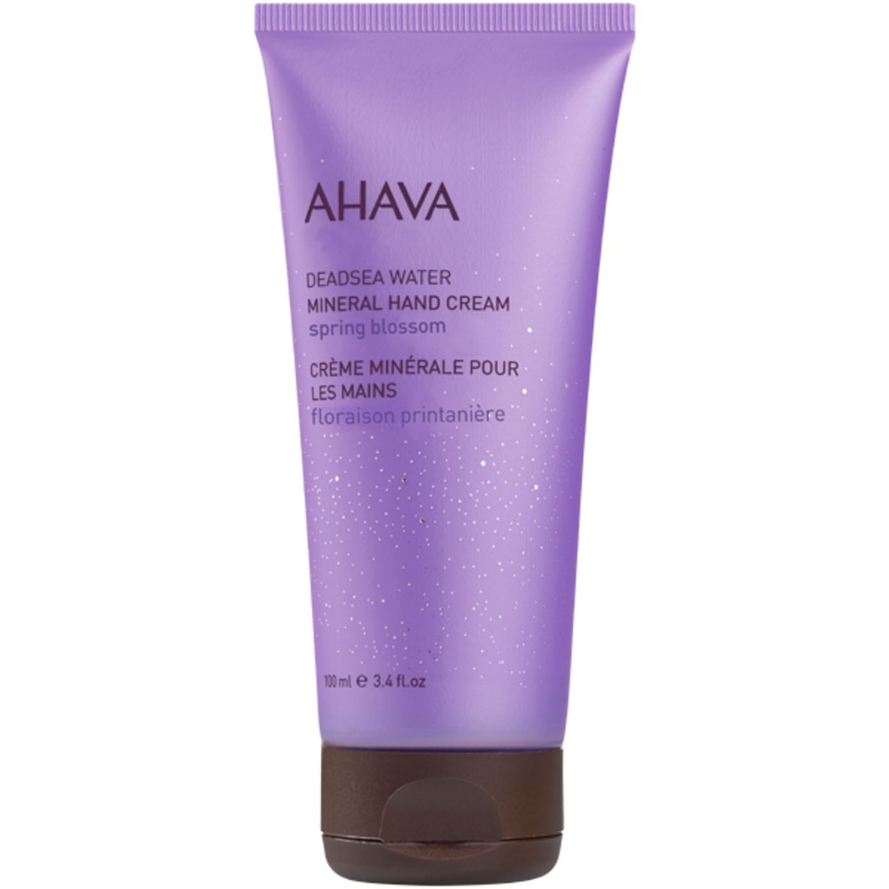 AHAVA Handcreme-Tube, lila. Aufschrift: AHAVA, Deadsea Water, Mineral Hand Cream Spring Blossom. Schwarzer Deckel.