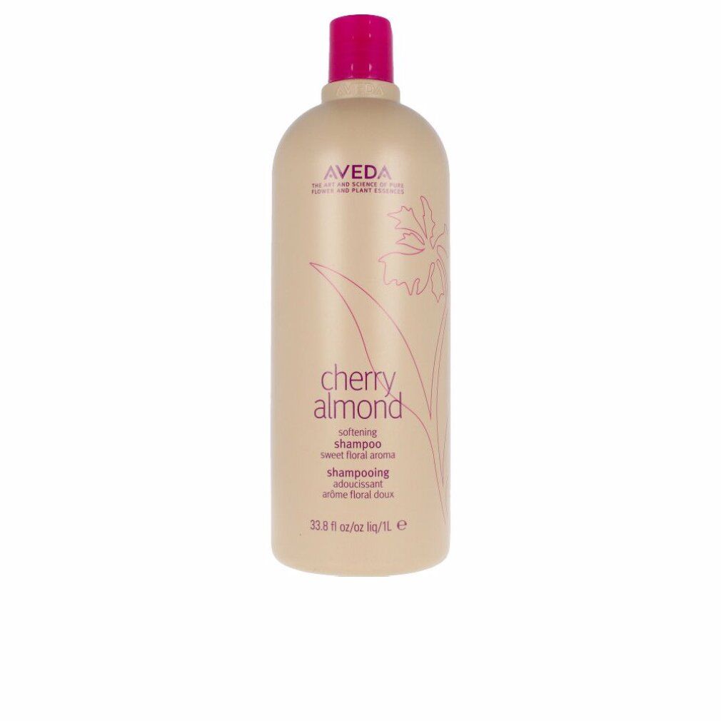 Beige Shampoo-Flasche mit pinkfarbenem Deckel. Aufschrift: Aveda, Cherry Almond, Shampoo. 33.8 fl oz/1L.