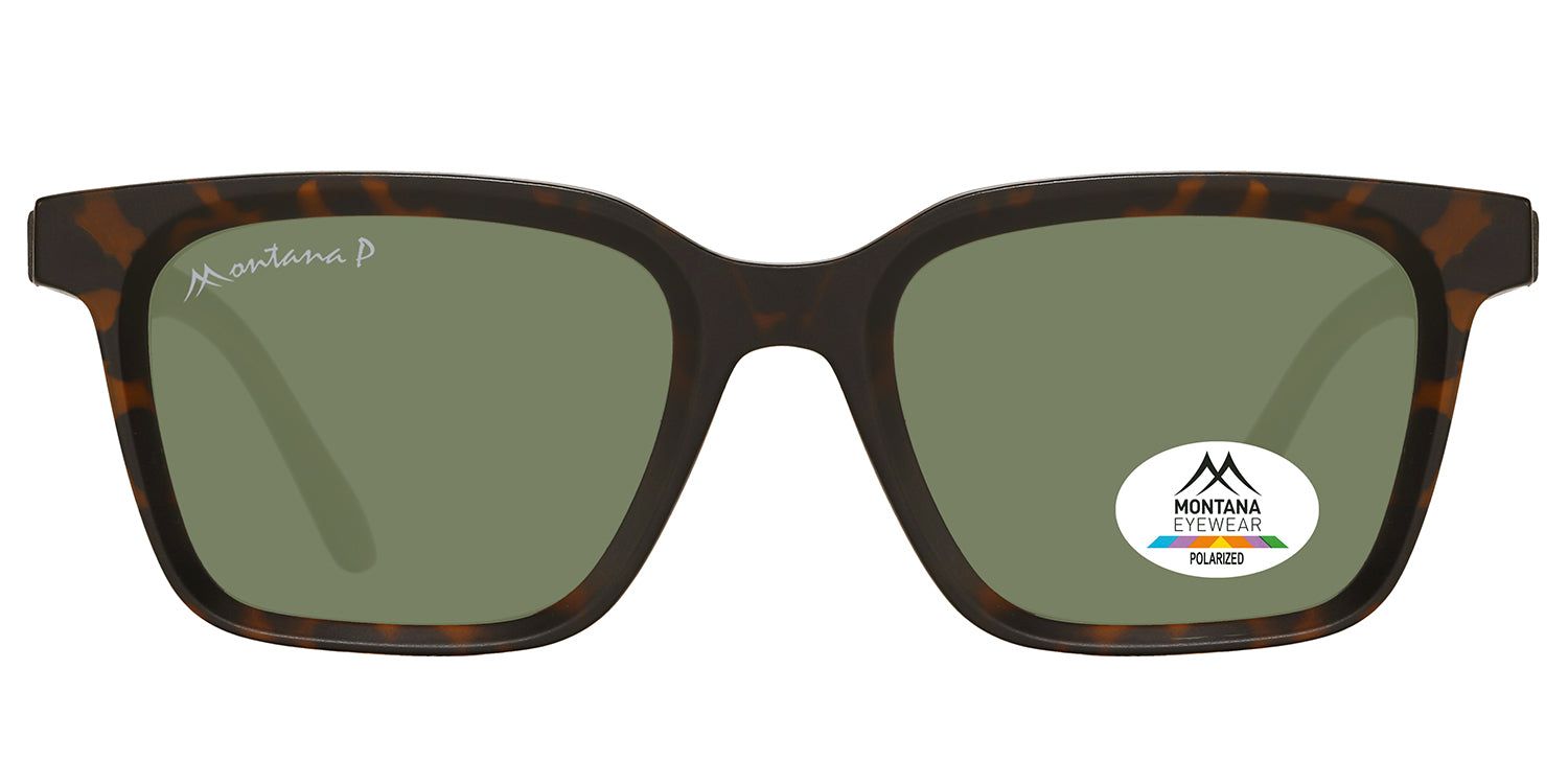 Sonnenbrille mit braunem Rahmen und grünen Gläsern. Auf einem Glas ist ein Aufkleber mit dem Logo von Montana Eyewear zu sehen.