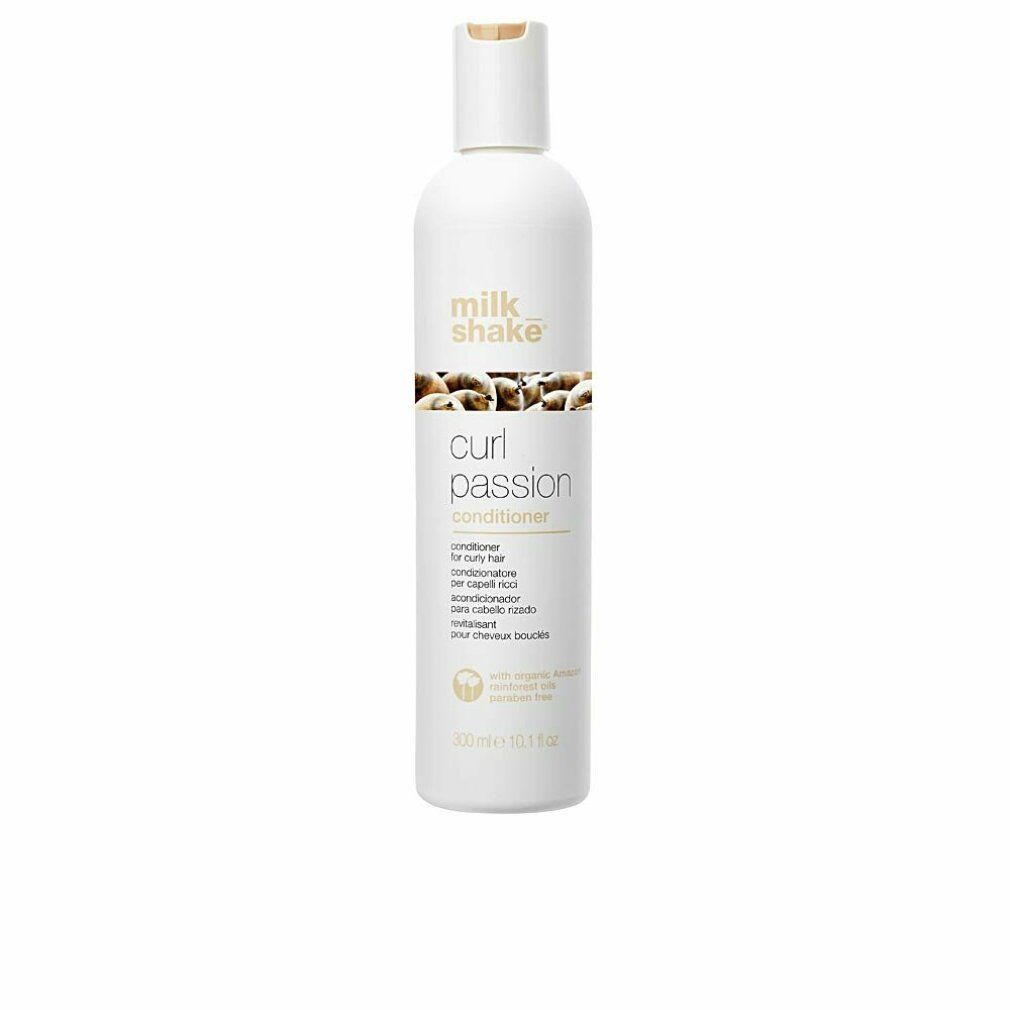 Weiße Flasche mit Conditioner. Aufschrift: Milk_shake, Curl Passion Conditioner. Für lockiges Haar. 300ml.