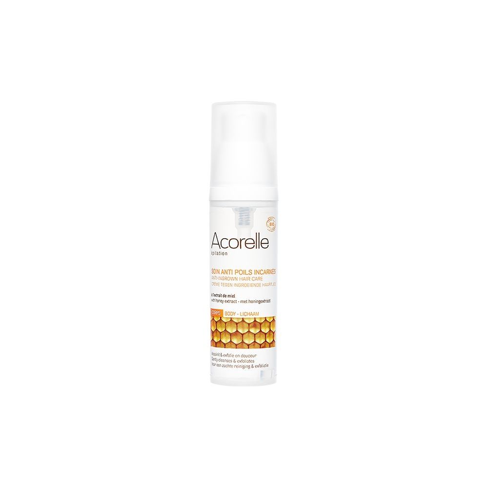 Weiße Flasche mit Zerstäuber. Aufschrift: Acorelle, Anti-Ingrown Hair Care. Honigwaben-Design.