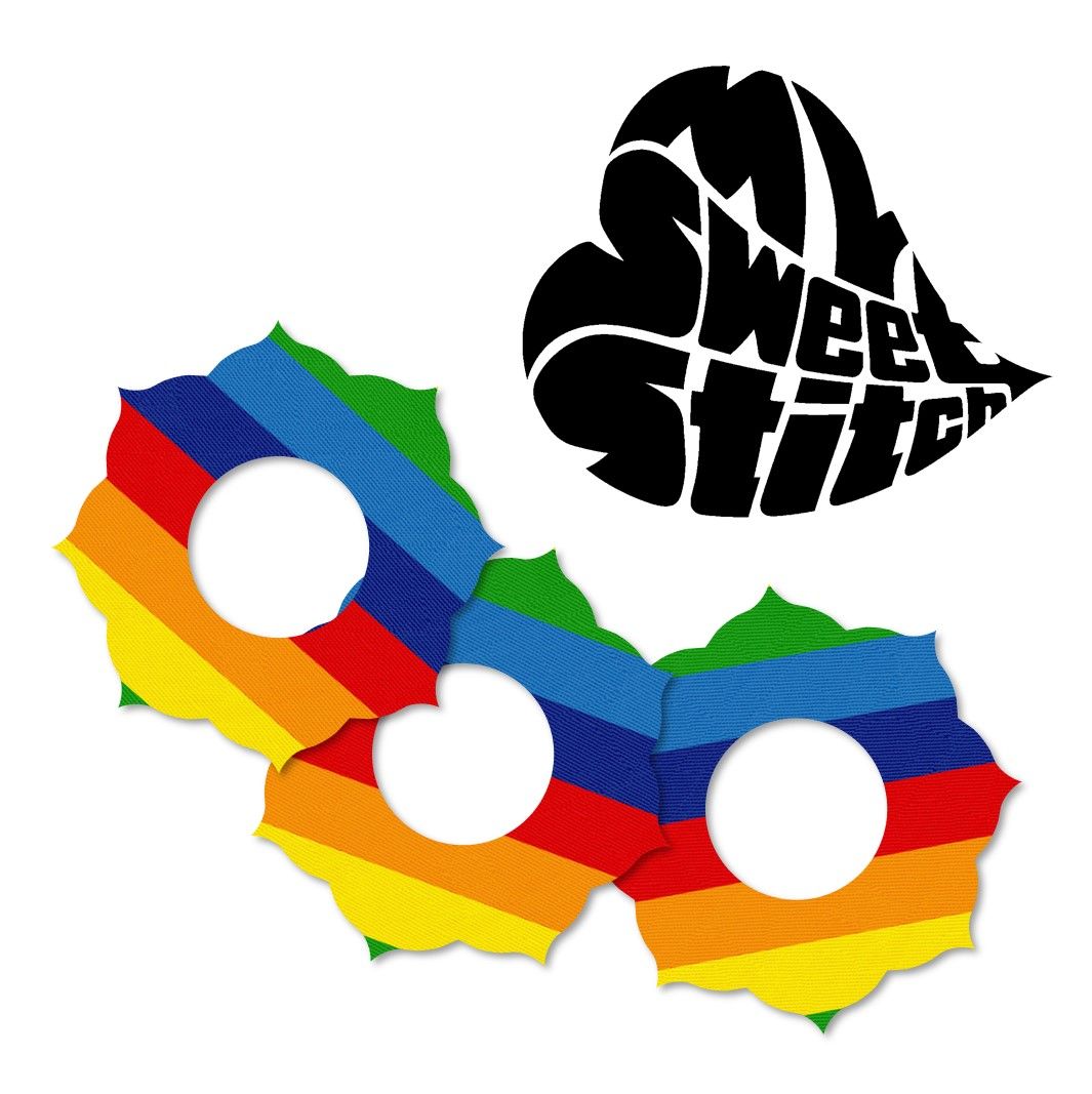 Mehrfarbige Fixierringe mit Regenbogenmuster und einem Herz-Logo mit Schriftzug.