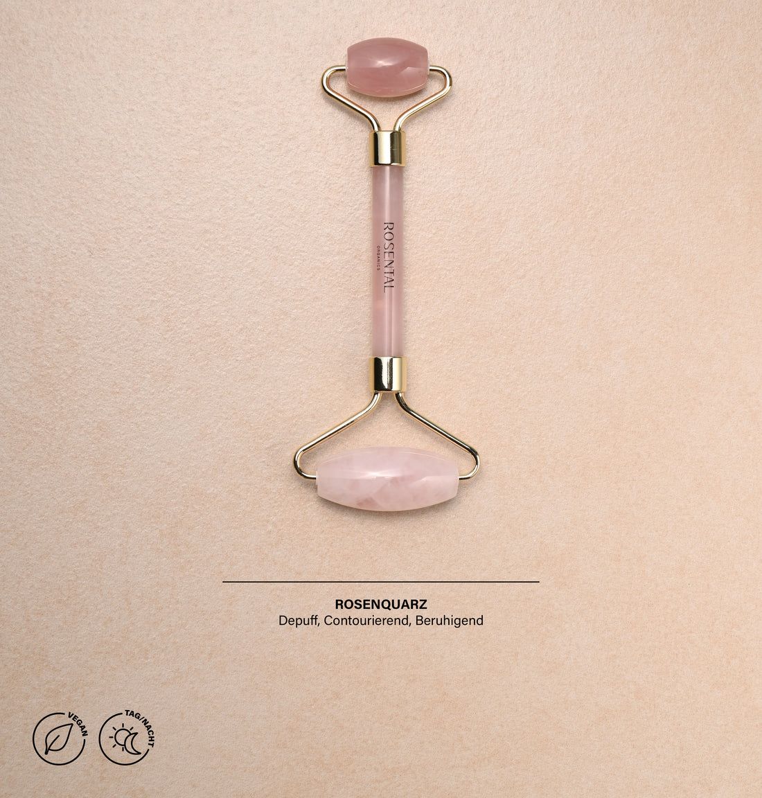 Gesichtsroller aus Rosenquarz mit goldfarbenem Gestell. Text: Rosenquarz, Depuff, Konturieren, Beruhigend. Vegan- und Sonnen-Symbol.