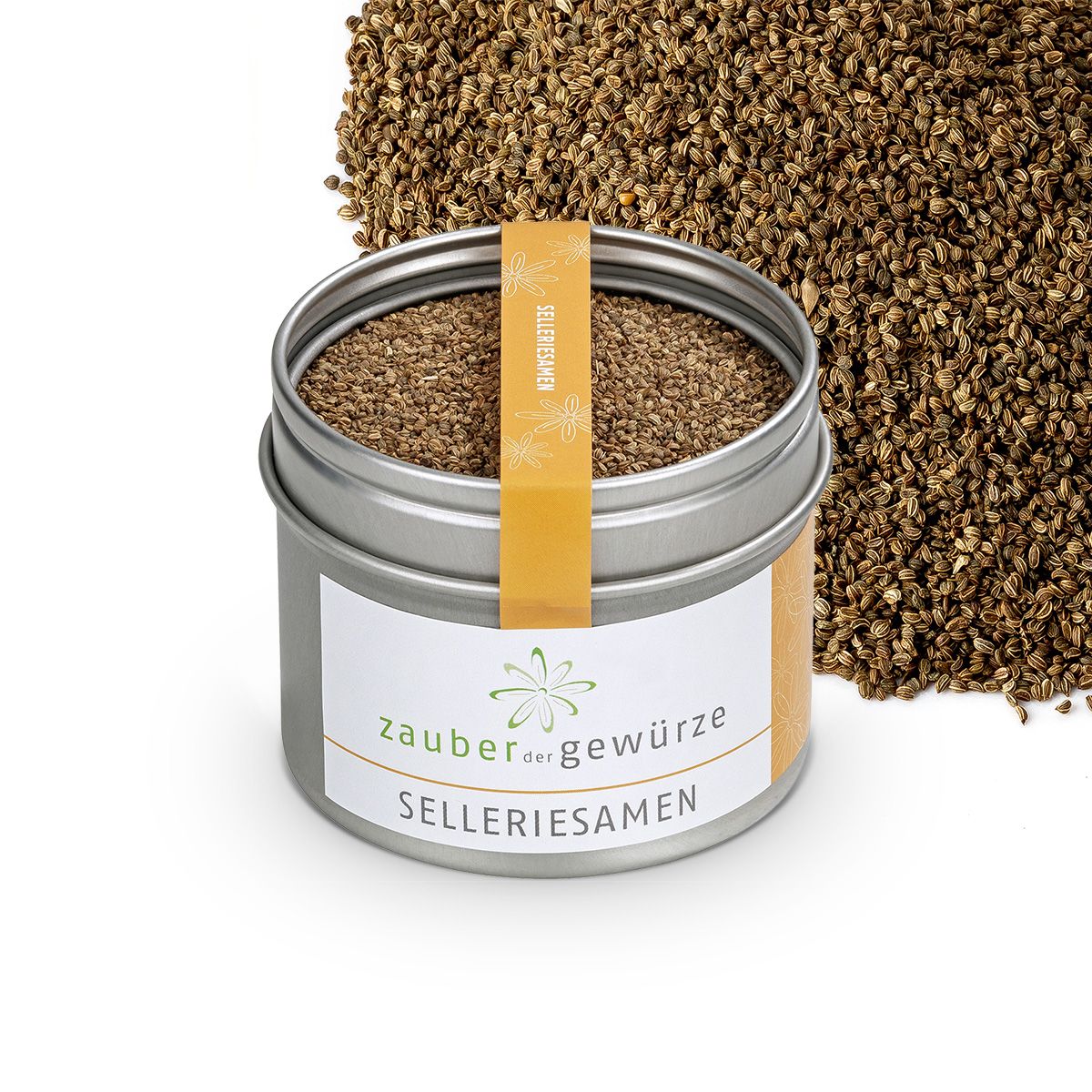 Geöffnete Dose Selleriesamen, daneben Haufen Selleriesamen. Etikett mit "Zauber der Gewürze" und "Selleriesamen". Gelber Streifen mit "Selleriesamen".