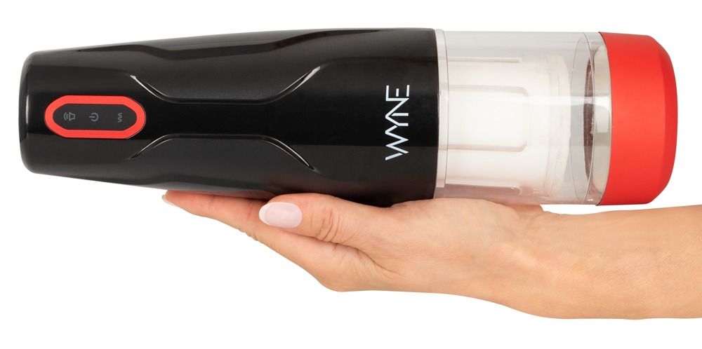 Hand hält schwarzen Masturbator mit rotem Ring und transparentem Gehäuse.