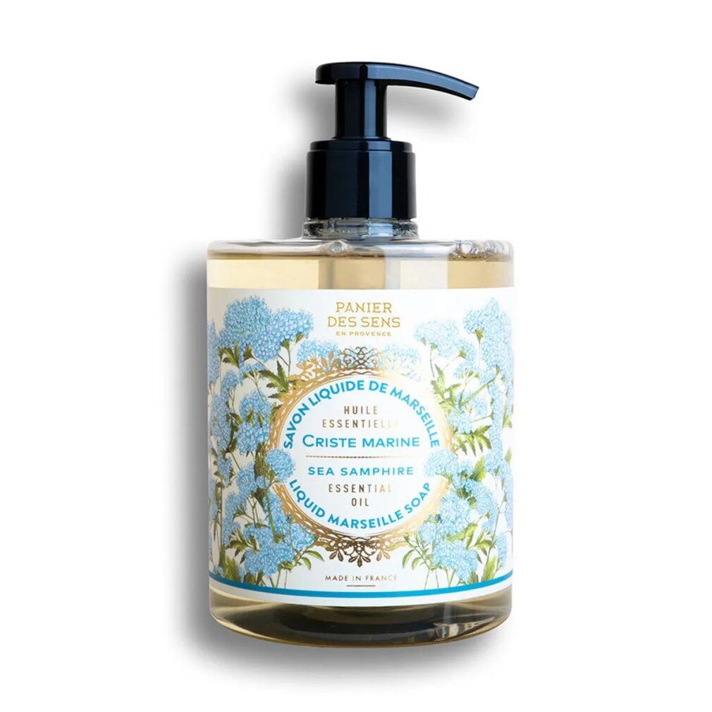 Flüssigseife in einer rechteckigen Flasche mit schwarzem Pumpspender. Etikett mit floralem Muster und Produktbezeichnung.