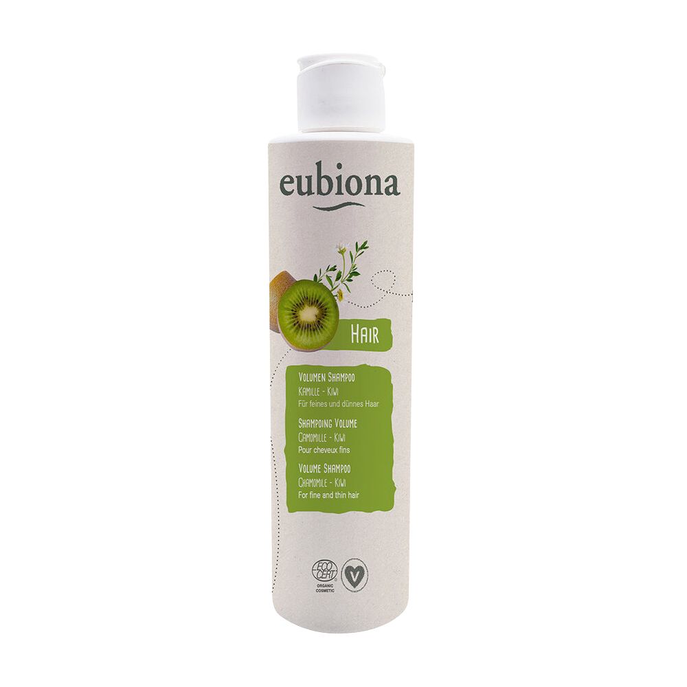 Zylindrische Flasche mit weißem Deckel. Aufschrift: Eubiona, Volumen Shampoo, Kamille-Kiwi. Grün-weiße Etikett mit Kiwi-Illustration.