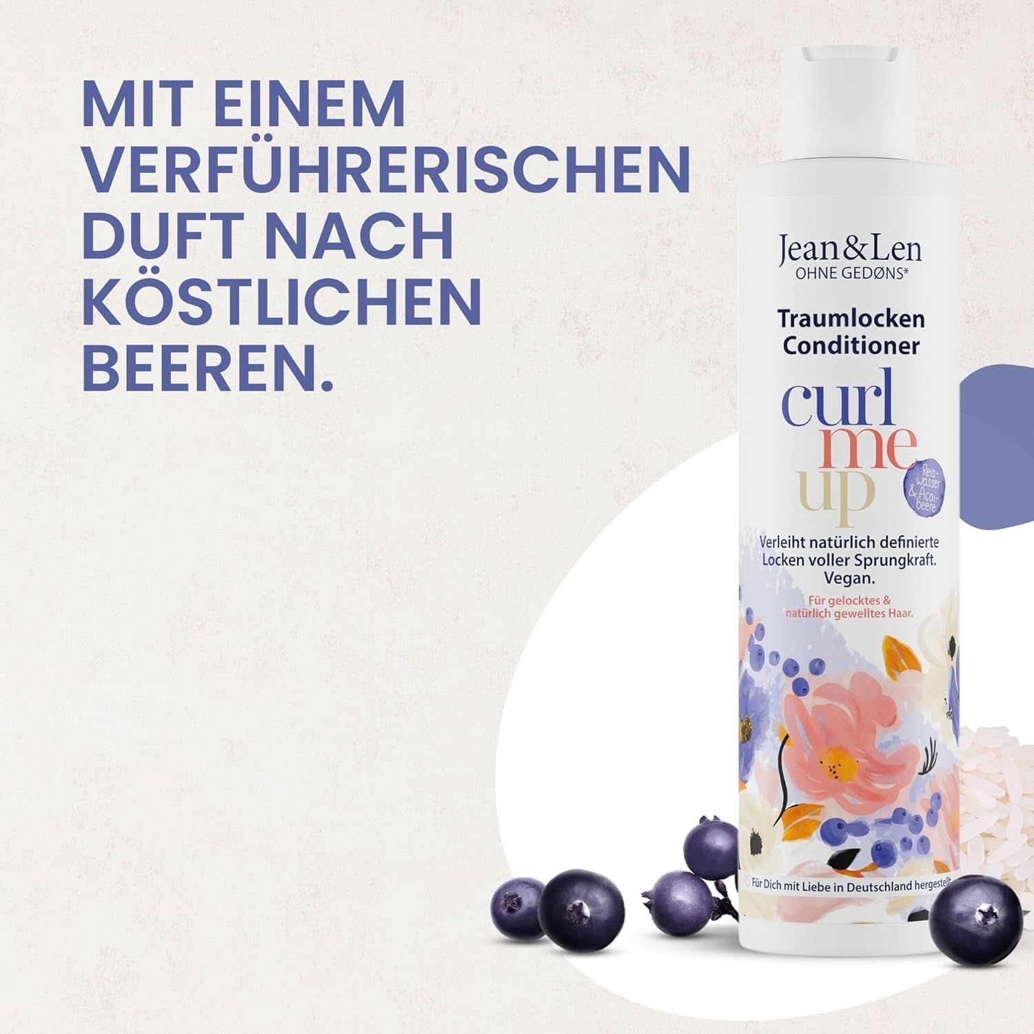 Flasche Jean & Len Traumlocken Conditioner. Text: Mit verführerischem Duft nach Beeren. Beeren liegen neben der Flasche.