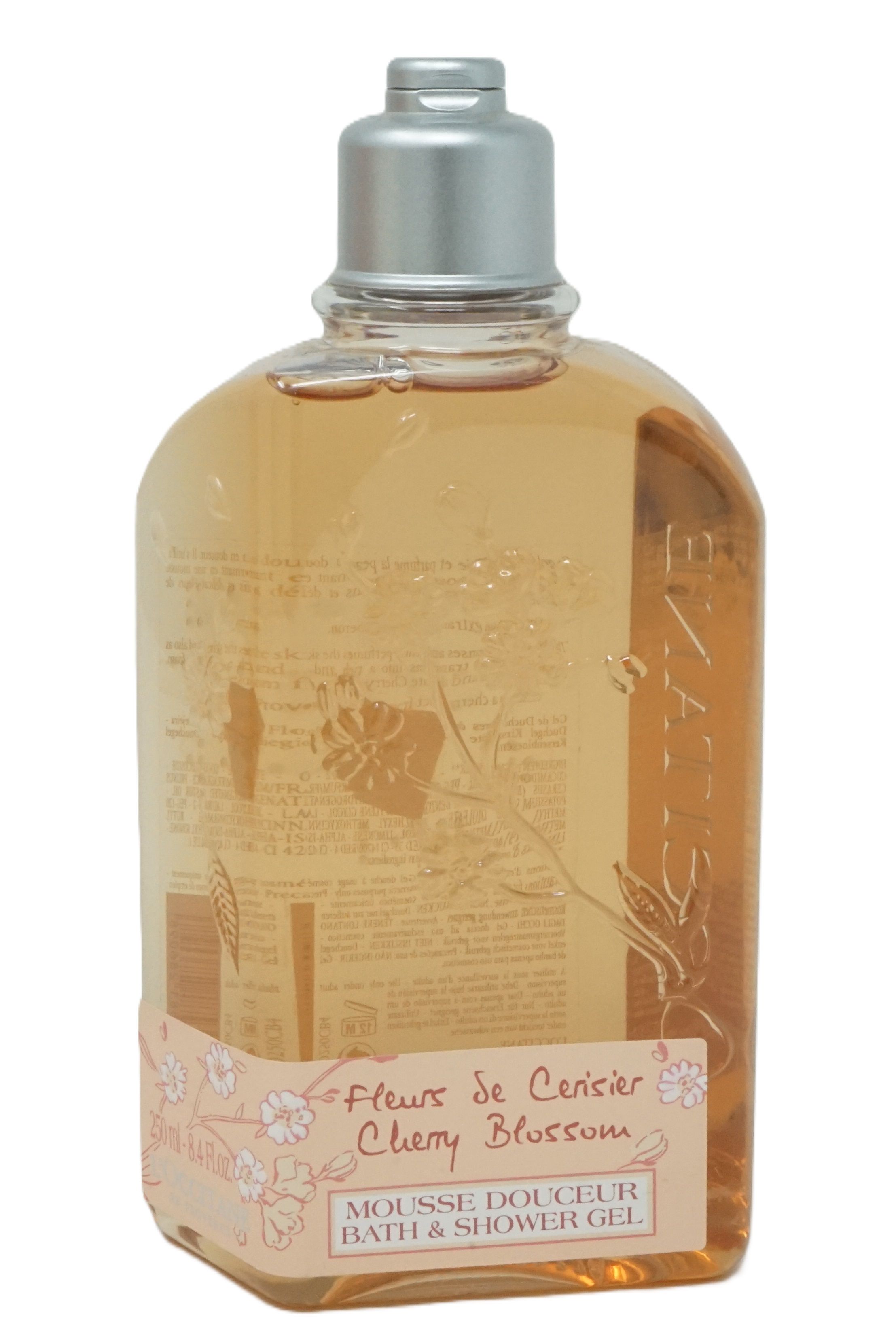 Klarflüssiges Duschgel in einer Flasche mit silbernem Deckel. Aufschrift: Fleurs de Cerisier Cherry Blossom, Mousse Douceur Bath & Shower Gel.