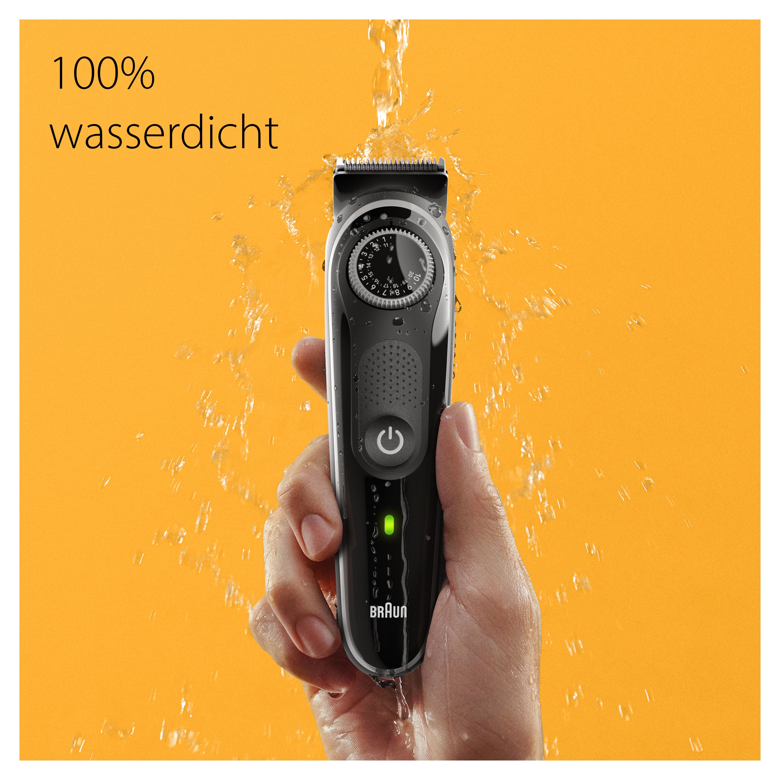 Hand hält wasserdichten Braun Bartschneider BT3440 unter fließendem Wasser.