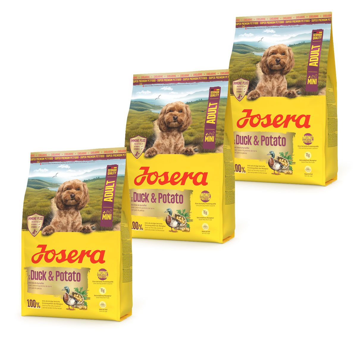Drei Säcke Josera Mini Ente & Kartoffel Hundefutter mit Hundebild und Entenmotiv.