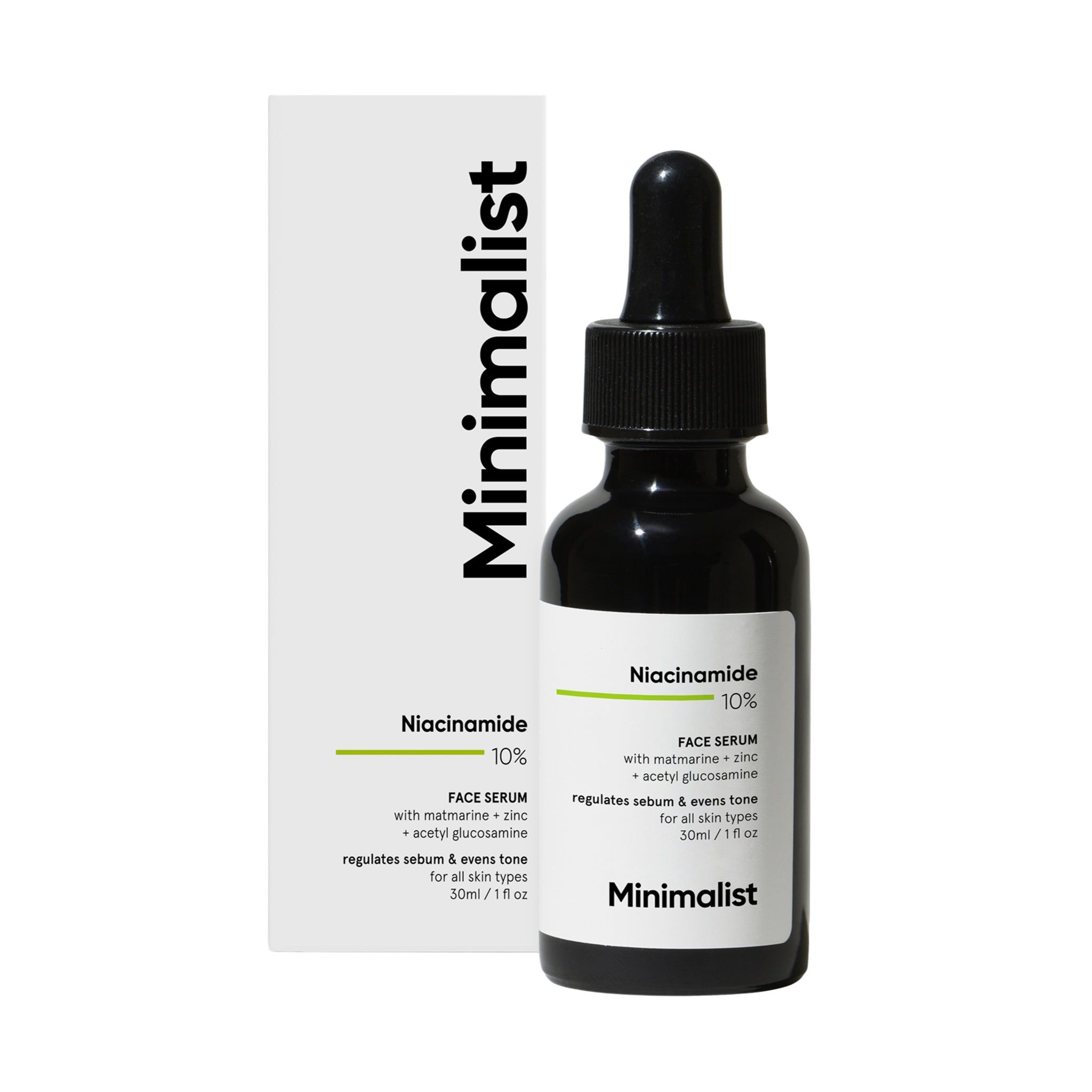 Flacon en verre brun avec bouchon noir et pipette. Emballage blanc avec "Minimalist" et informations produit. "Niacinamide 10% Face Serum".