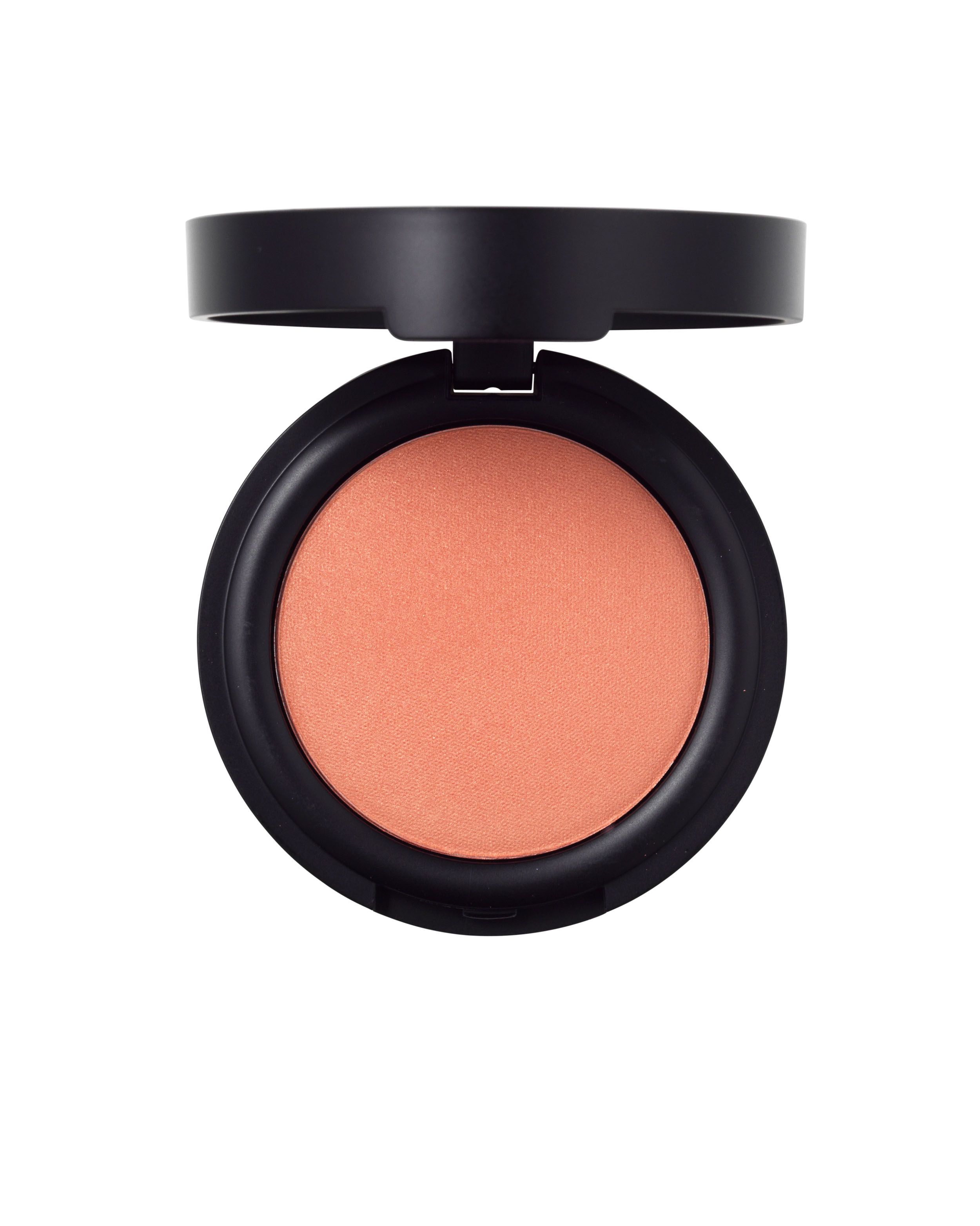 Ein runder, pfirsichfarbener Rouge-Puder in einem schwarzen Behälter mit offenem Deckel.