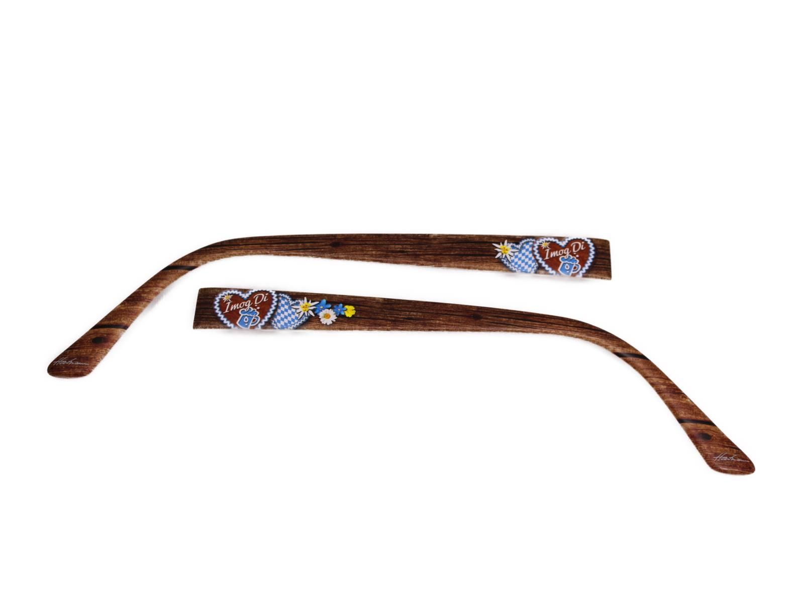 Zwei braune Brillenbügel mit Holzmaserung. Verziert mit Herzen, Blumen und Schriftzug.