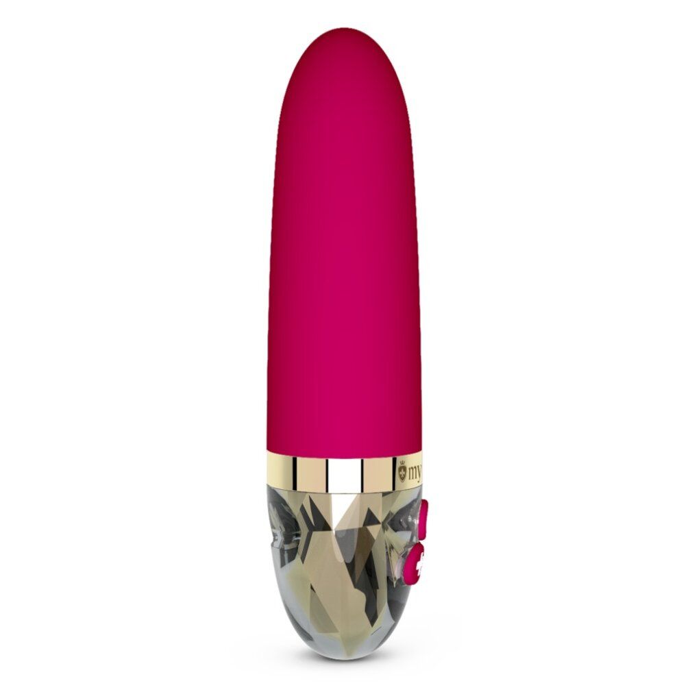 Fuchsiafarbener Vibrator mit goldfarbenen Akzenten. Bedienknöpfe. Kristalloptik am unteren Ende.