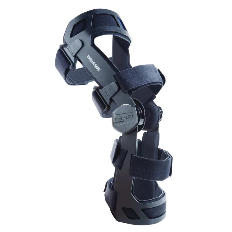 Kniebandage THUASNE Genupro Control, schwarz. Mit Klettverschlüssen und Gelenken. Seitliche Stabilisierung. Sichtbares Markenlogo.